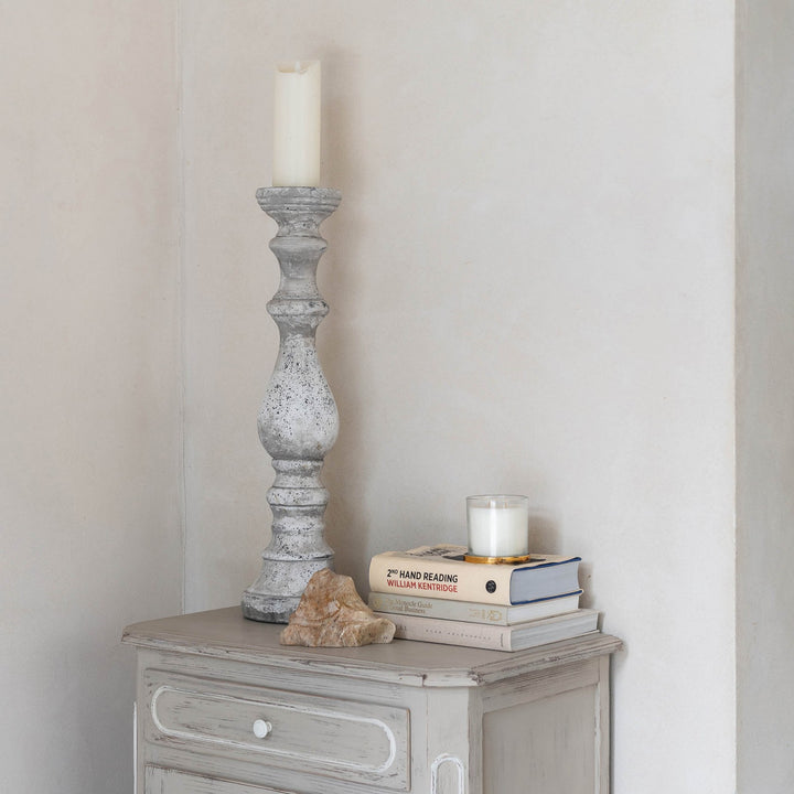 Cornucopia Home and Gift Birkdale Pillar Stone Candleholder, sturdy beige pillar with textured stone appearance, perfect for decorative lighting.