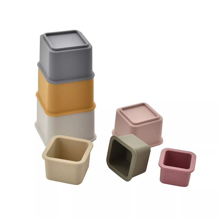Colorful Bambino Silicone Stacking Cups by Widdop &amp; Co for Cornucopia Home and Gift, neatly stacked for display.