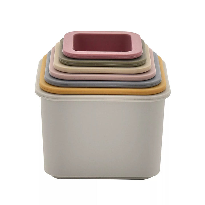 Colorful Bambino Silicone Stacking Cups by Cornucopia Home and Gift in a neat pyramid shape on a white background.