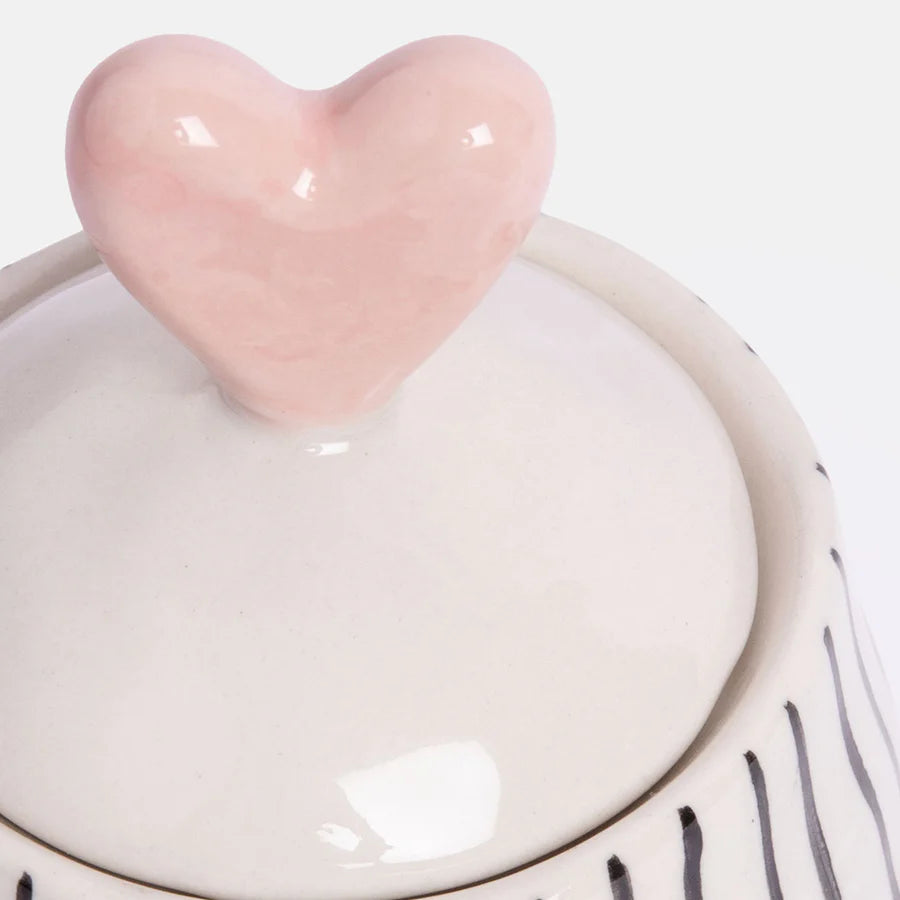 Caroline Gardner pink and mustard stripe heart lid jar in stoneware, featuring a stylish heart-shaped lid.