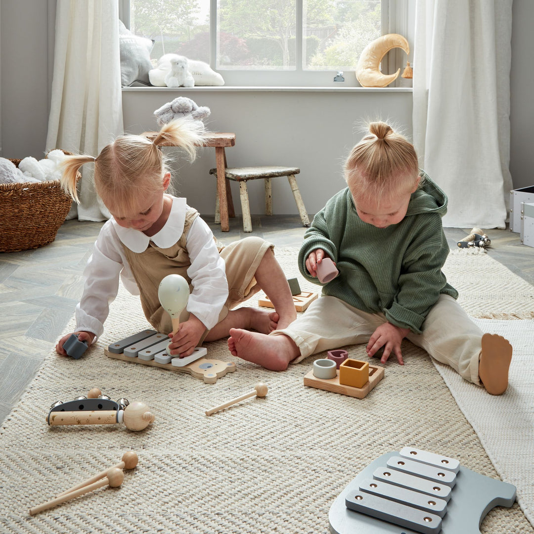 Wooden Teddy Xylophone by Widdop &amp; Co featuring colorful wooden bars and a teddy bear design for kids&