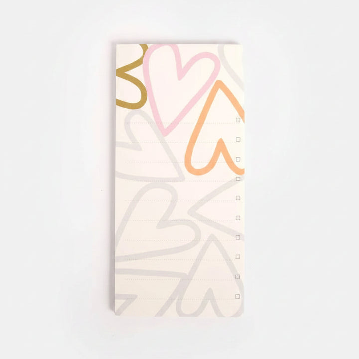 Caroline Gardner Colourblock Hearts list pad featuring vibrant pink, red, and white heart designs on a colorful background.