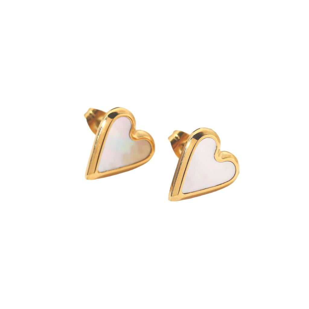 White leaf-shaped mother of pearl heart stud earrings from Cornucopia Home and Gift, showcasing elegant jewelry design.