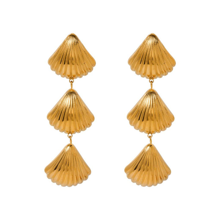 White leaf-shaped gold triple drop shell earrings with intricate design by Cornucopia Home and Gift.