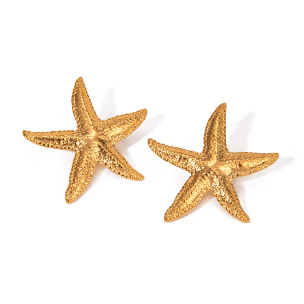 White leaf-shaped earrings with gold starfish accents, oversized style, by Cornucopia Home and Gift.