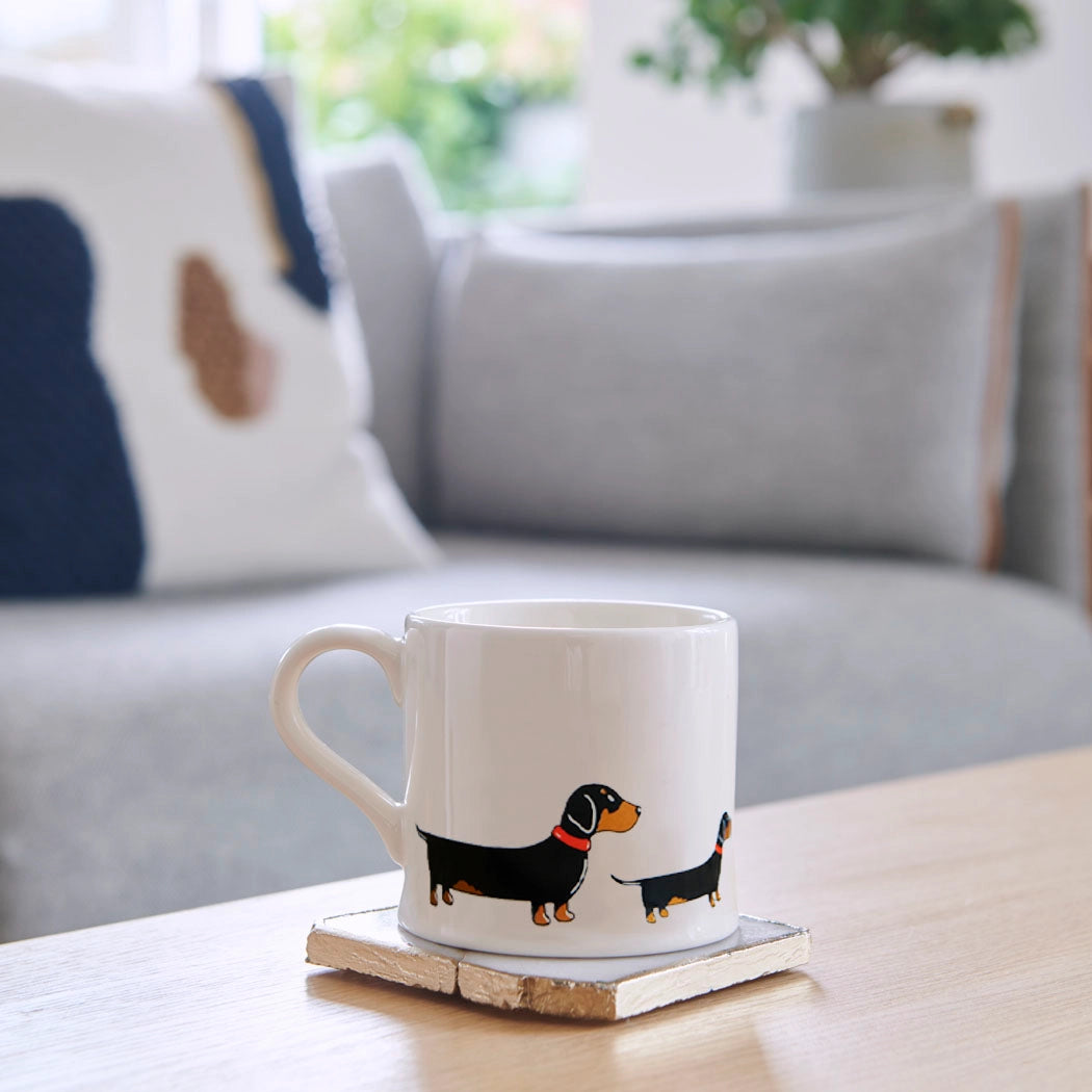 Sweet William Dachshund dog mug by Cornucopia Home and Gift featuring a cute dachshund design on a ceramic coffee mug.