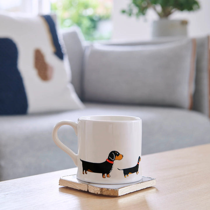 Sweet William Dachshund dog mug by Cornucopia Home and Gift featuring a cute dachshund design on a ceramic coffee mug.