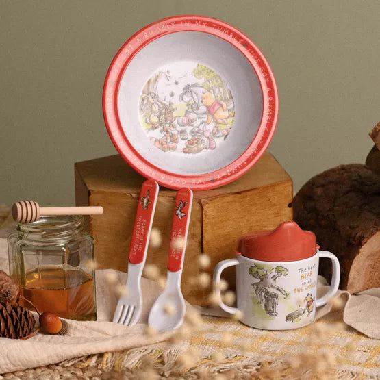 Disney Winnie the Pooh melamine 4-piece dinner set by Cornucopia Home and Gift, featuring colorful Pooh and friends design.
