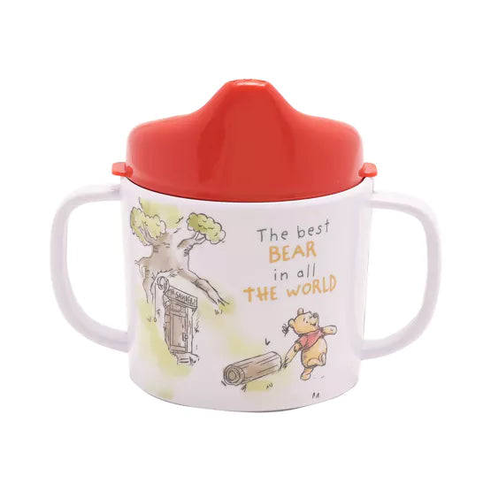 Disney Winnie the Pooh melamine 4-piece dinner set by Widdop &amp; Co featuring colorful Pooh and friends on plates and bowls.