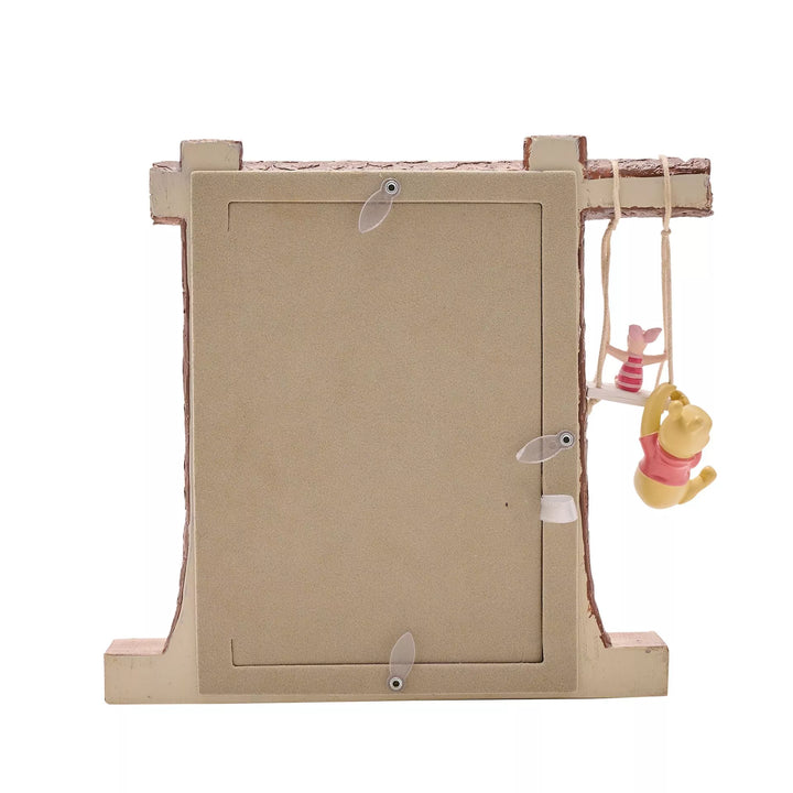 Winnie the Pooh and Piglet swinging in a photo frame by Widdop &amp; Co, featuring charming Disney character artwork.