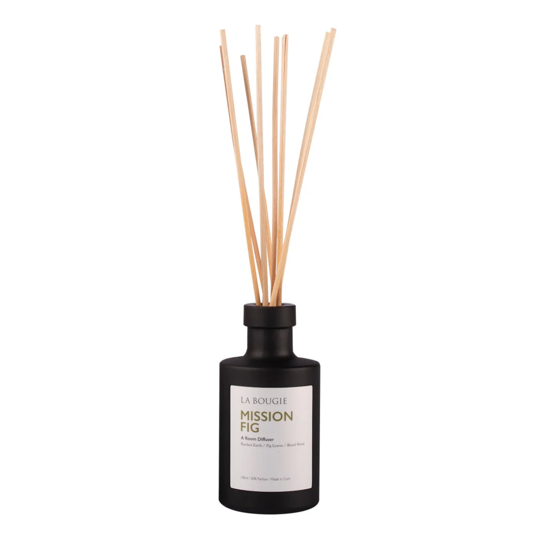 Cornucopia Home and Gift Mission Fig La Bougie room diffuser with a sleek glass bottle and reed sticks for home fragrance.