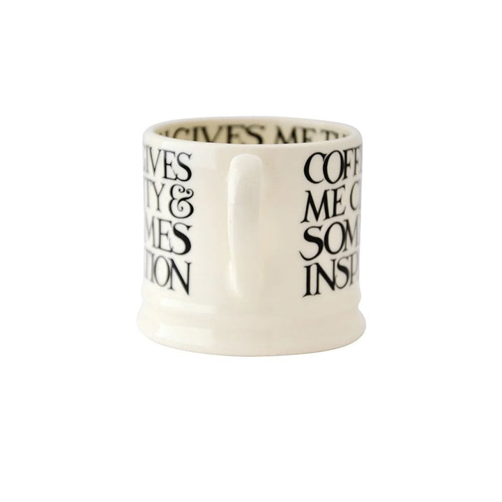 Emma Bridgewater Black Toast all-over writing small ceramic mug with black and white toast pattern on white background.