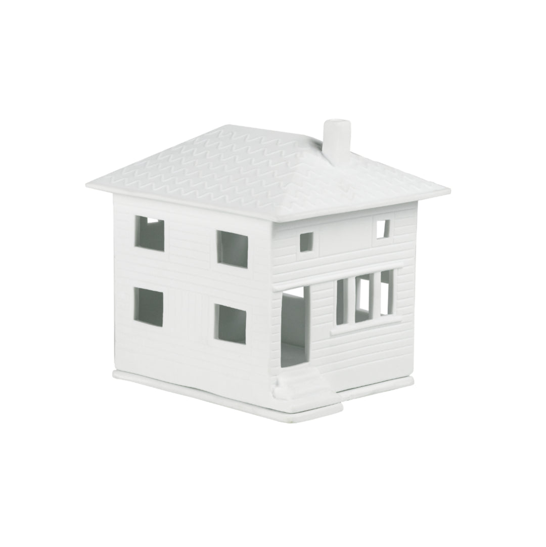 Porcelain light house figurine named Räder City Villa by Cornucopia Home and Gift, featuring intricate cityscape details.