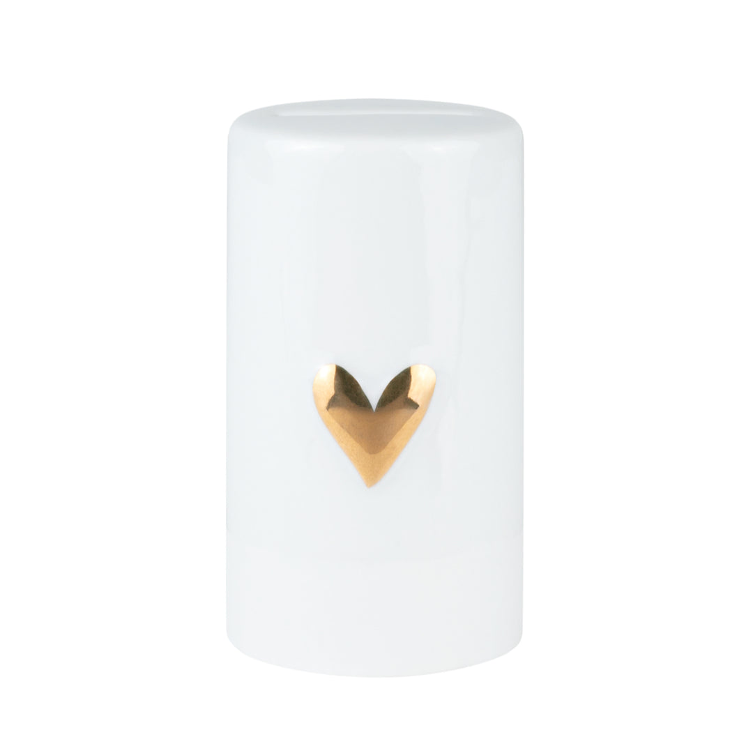 Gold heart-shaped Radër moneybox by Cornucopia Home and Gift with detailed heart design and smooth finish.