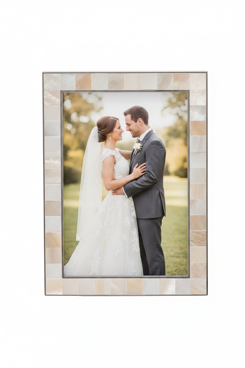 Metal and mother of pearl photo frame by Widdop & Co, featuring elegant design and a polished finish for displaying cherished photos.