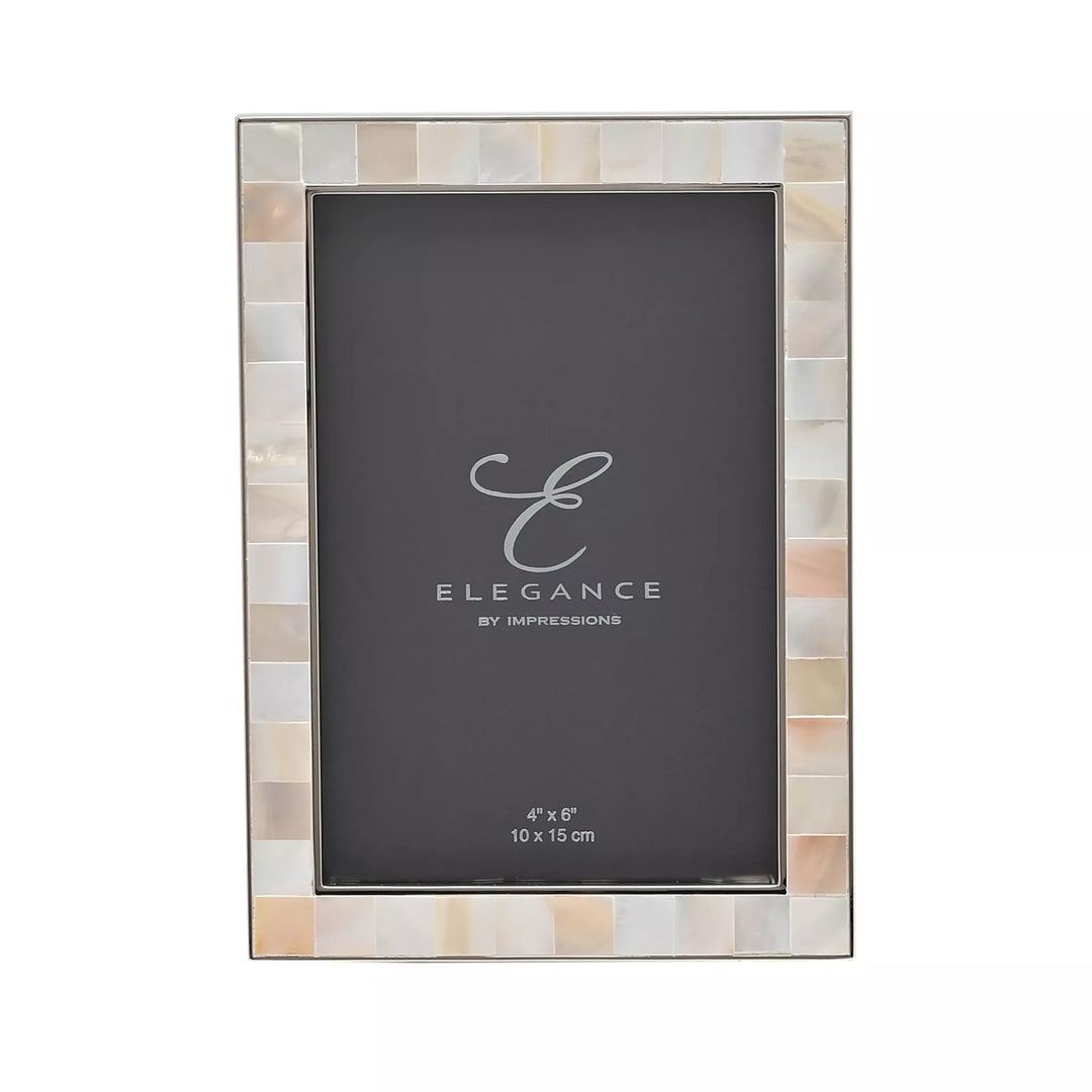 Metal and mother of pearl photo frame by Widdop & Co, featuring elegant design and a polished finish for displaying cherished photos.