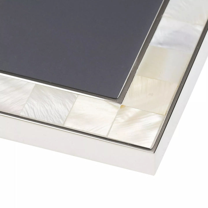Metal and mother of pearl photo frame by Widdop &amp; Co, Cornucopia Home and Gift, showcasing a decorative frame with intricate pearl accents.
