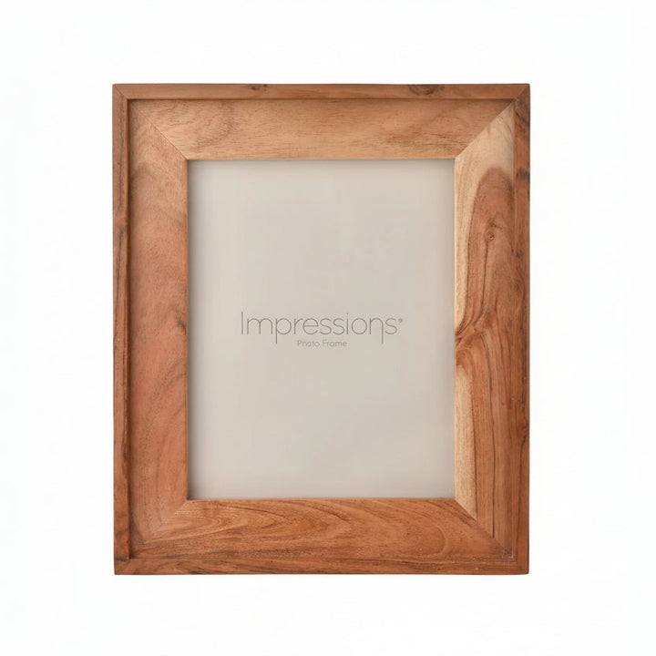 Wooden 5 x 7 photo frame by Widdop &amp; Co from Cornucopia Home and Gift, showcasing a classic, natural wood finish with a sleek design.