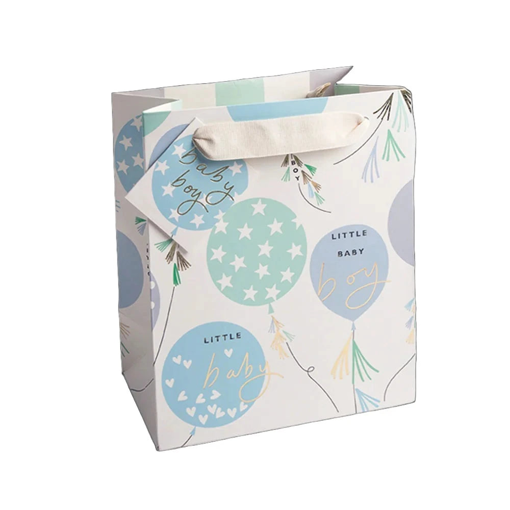 Medium gift bag featuring baby boy balloons and Caroline Gardner branding, ideal for baby shower gifts from Cornucopia Home and Gift.
