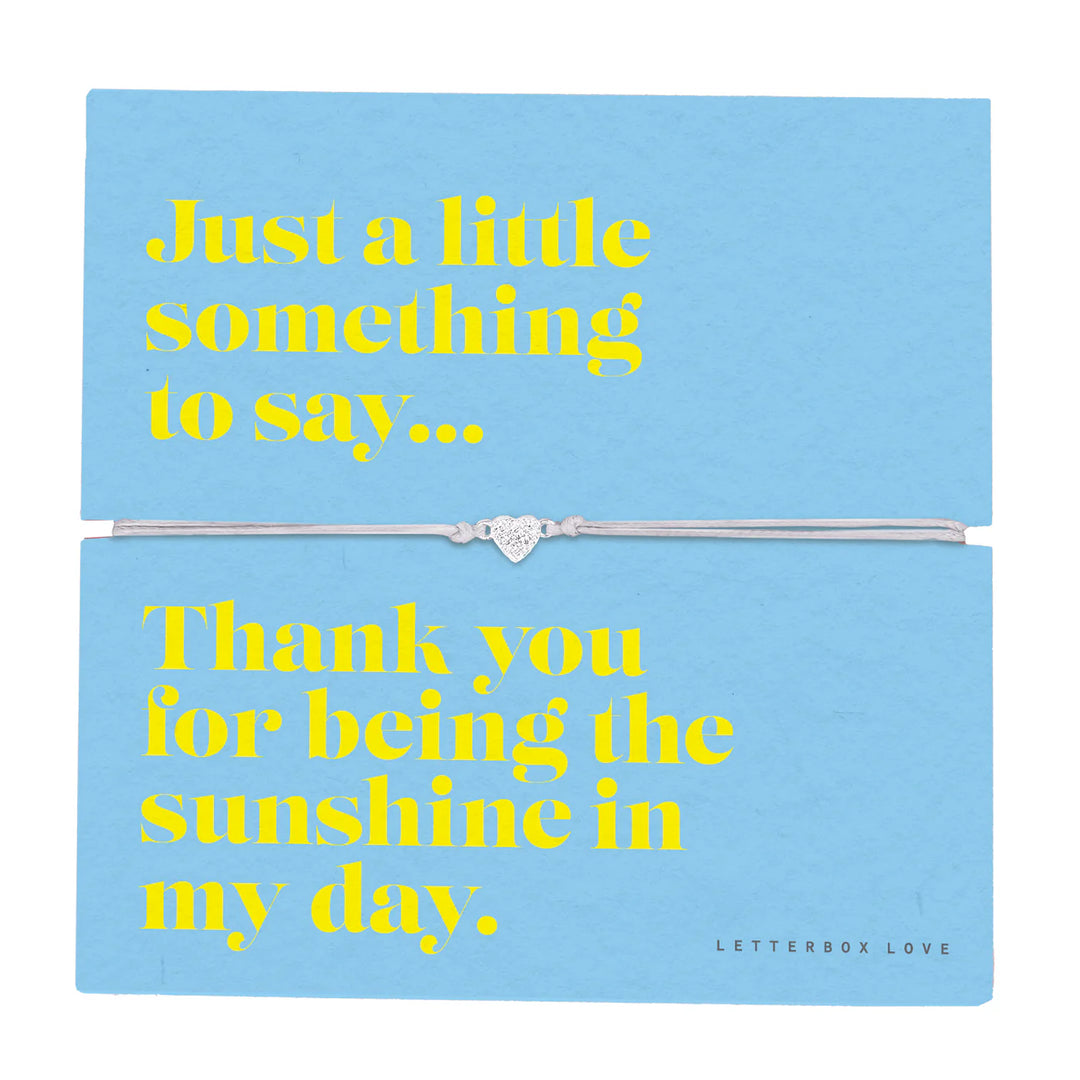 Sunshine Sentiment Bracelet by Cornucopia Home and Gift featuring a heart-shaped friendship charm, perfect as a letterbox love gift.
