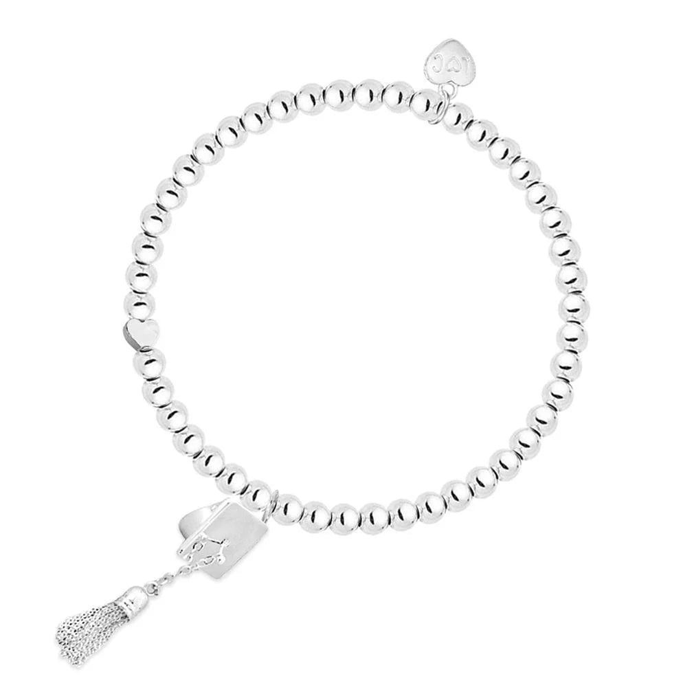 Graduation Day bracelet from Cornucopia Home and Gift featuring life charms, with colorful beads and a celebratory design.