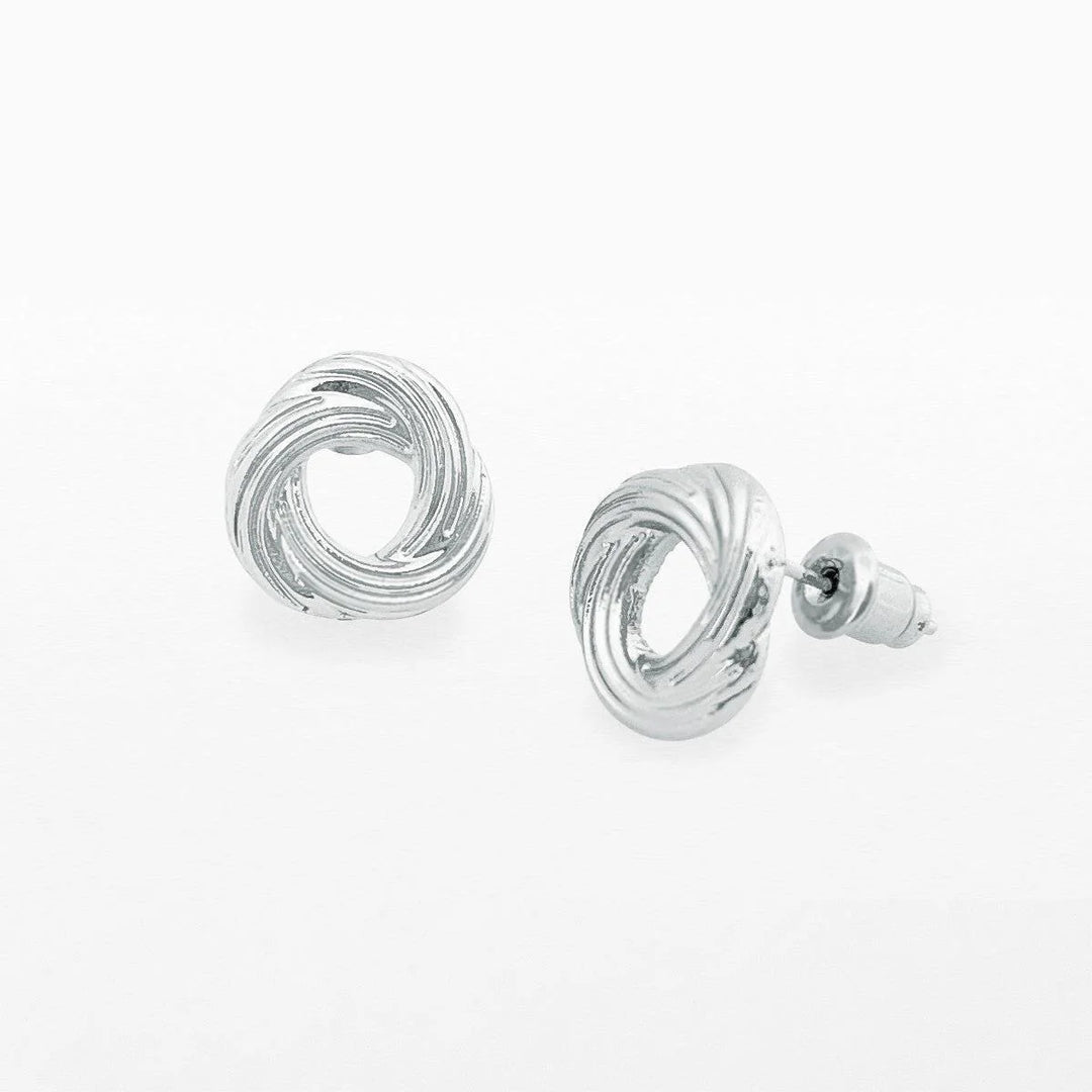 Silver knot stud earrings by Life Charms from Cornucopia Home and Gift, featuring sleek silver knots on a white background.