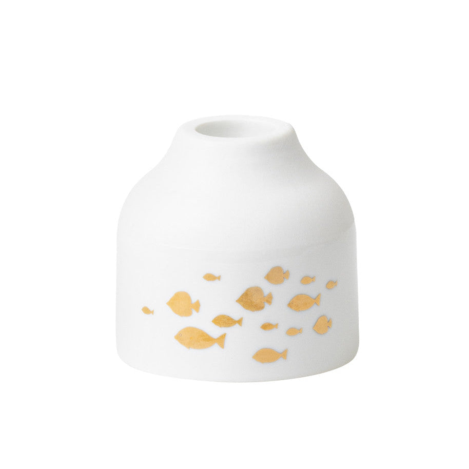 Gold fish candle holder by Radër, from Cornucopia Home and Gift, featuring a detailed gold fish design perfect for decorative lighting.