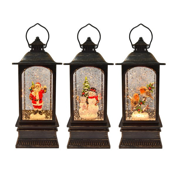 LED Christmas spinner lantern by Cornucopia Home, 22cm, featuring three assorted festive designs with bright, colorful holiday illumination.