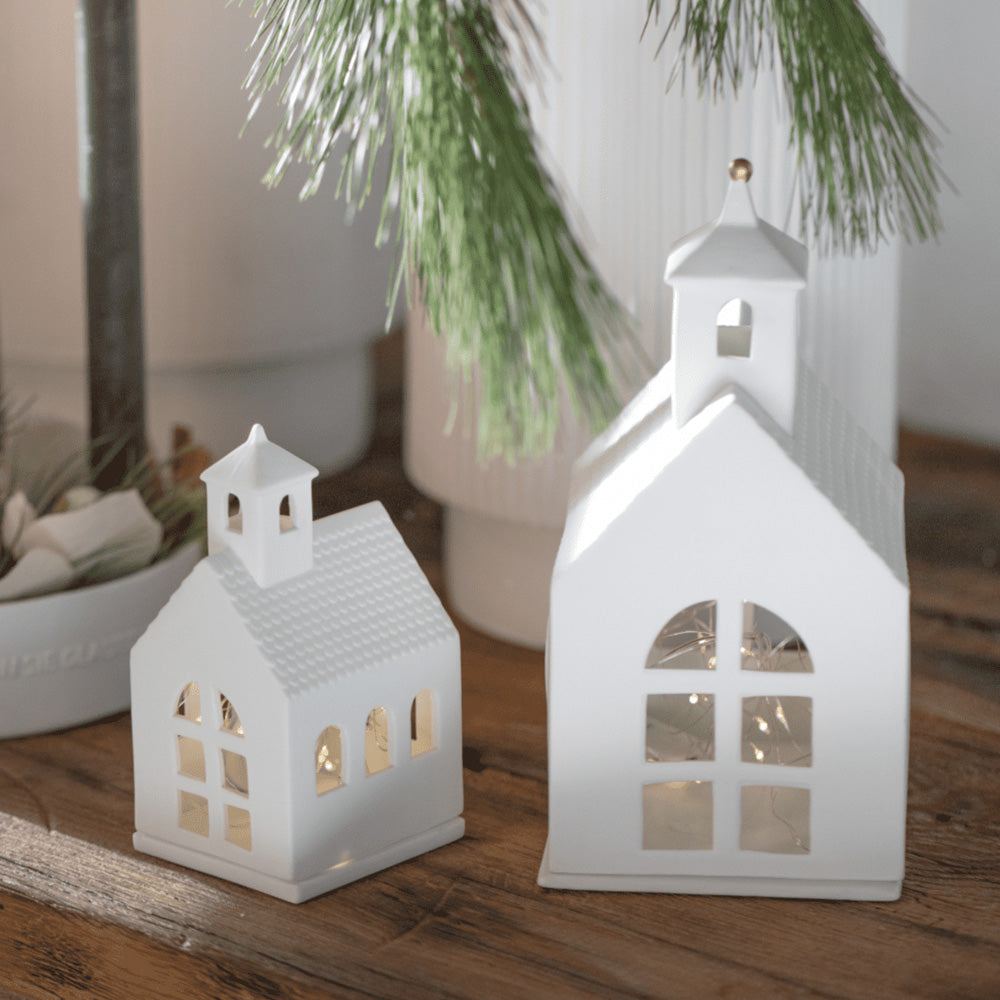 Large Radër Chapel Tea Light House by Cornucopia Home and Gift, featuring a detailed lighthouse design with a cut-out chapel window.
