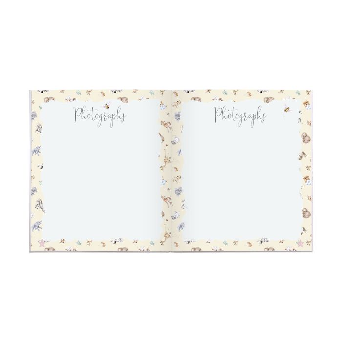Baby record book by Wrendale Designs featuring charming animal illustrations, perfect for capturing baby milestones and memories.