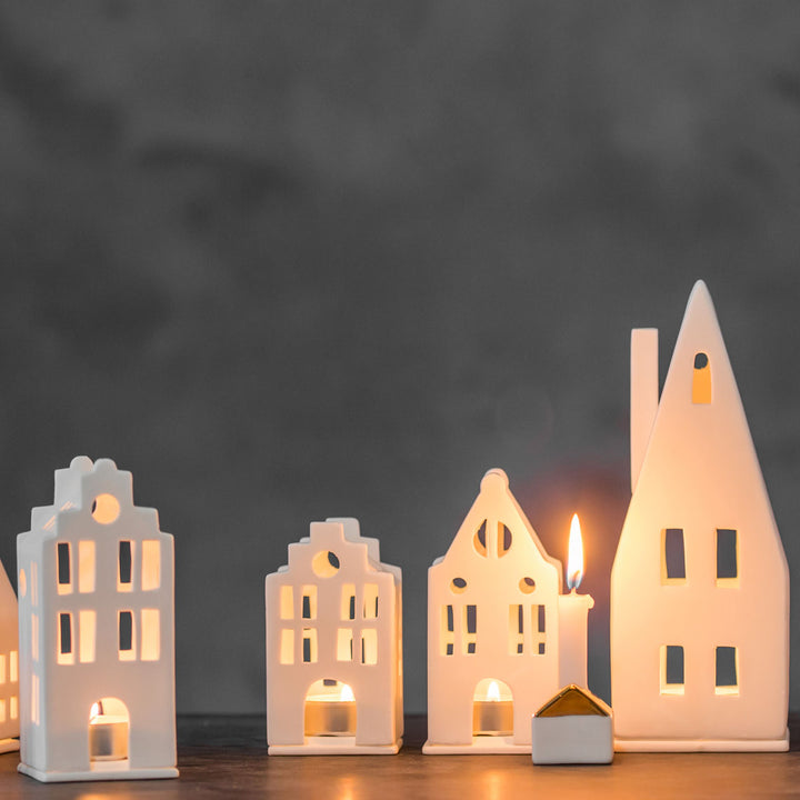 Radër Small Town Canal Tea Light House by Cornucopia Home and Gift featuring a charming canal scene with small town details.