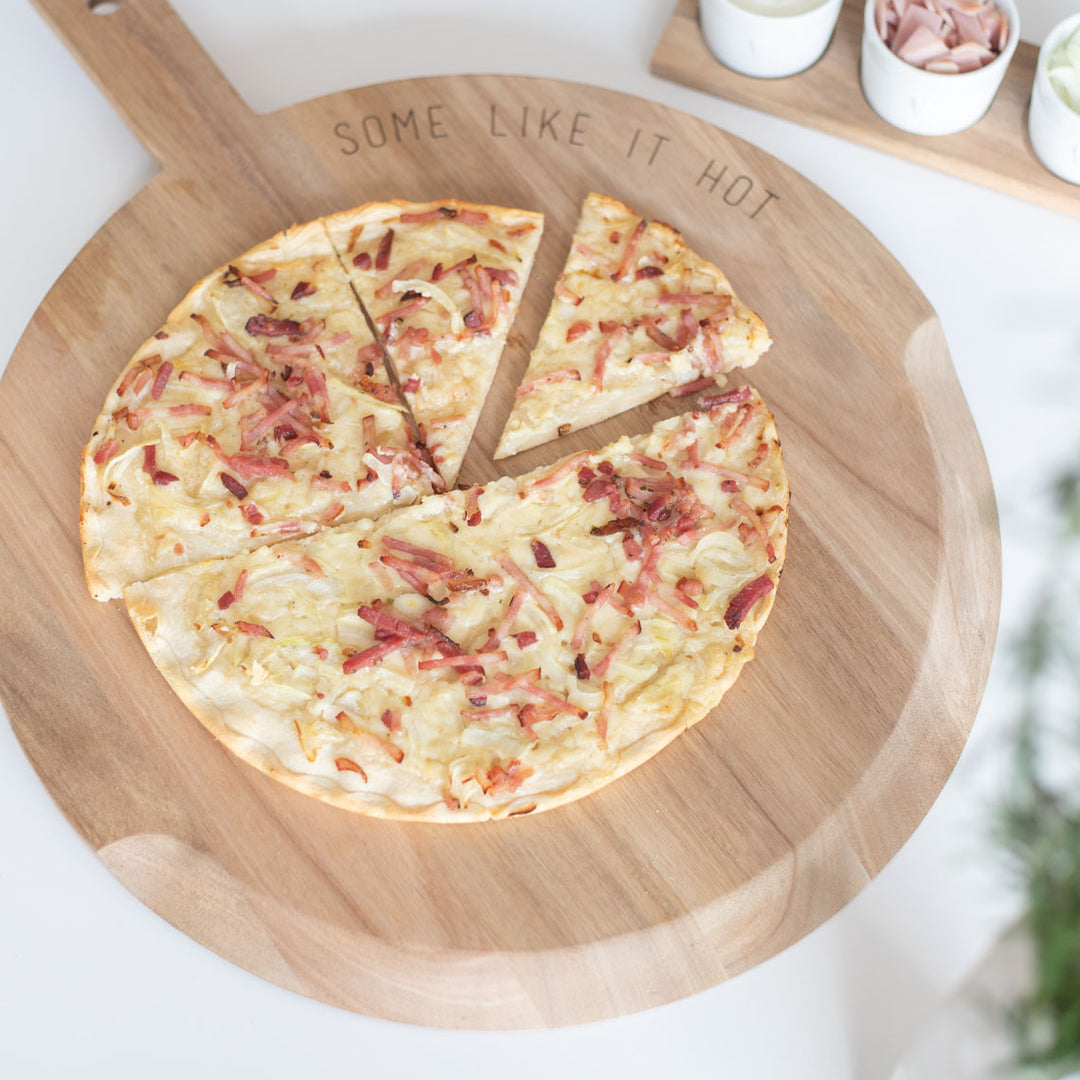 Radër acacia wood pizza and tart serving tray by Cornucopia Home and Gift, featuring a rectangular design with raised edges.