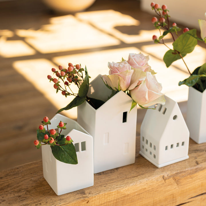 Radër Räder Barn Vase by Cornucopia Home and Gift featuring a unique, handcrafted ceramic design with colorful wheel patterns.