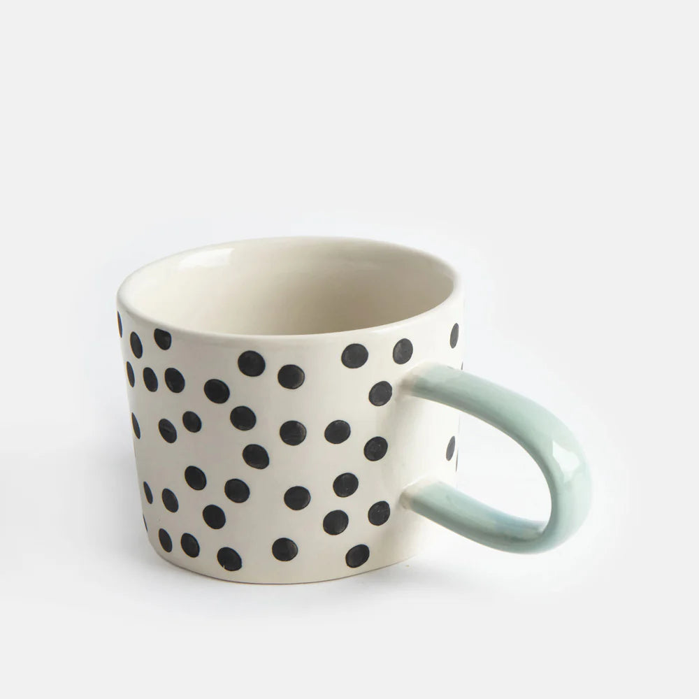 Caroline Gardner Mono Ditsy Spot Mug featuring a white background with small black polka dots, ceramic coffee cup for gifts