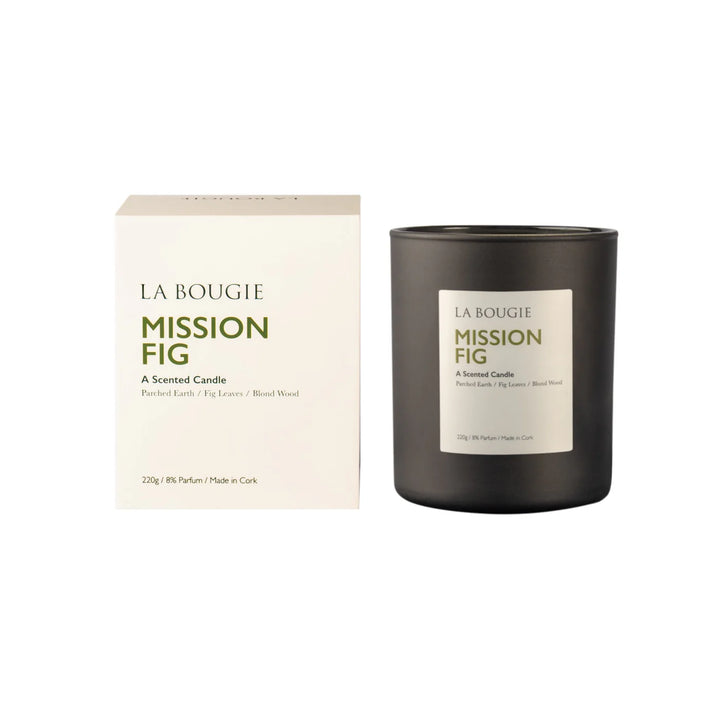Cornucopia Home and Gift Mission Fig La Bougie candle with a lit wick and decorative container, showcasing the elegant design.