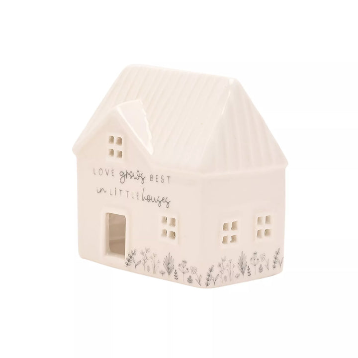 Ceramic house-shaped tea light holder by Widdop &amp; Co from Cornucopia Home and Gift, designed to hold a small tea light candle.