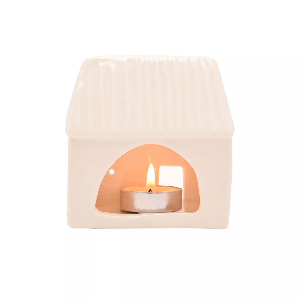 Ceramic house-shaped tea light holder by Widdop & Co from Cornucopia Home and Gift, featuring a detailed house design for decorative lighting.