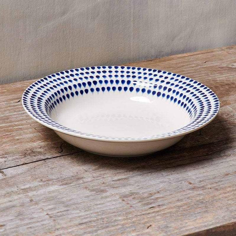 Nkuku Indigo Drop Pasta Bowl with blue and white glaze, round ceramic bowl designed for pasta or serving dishes.