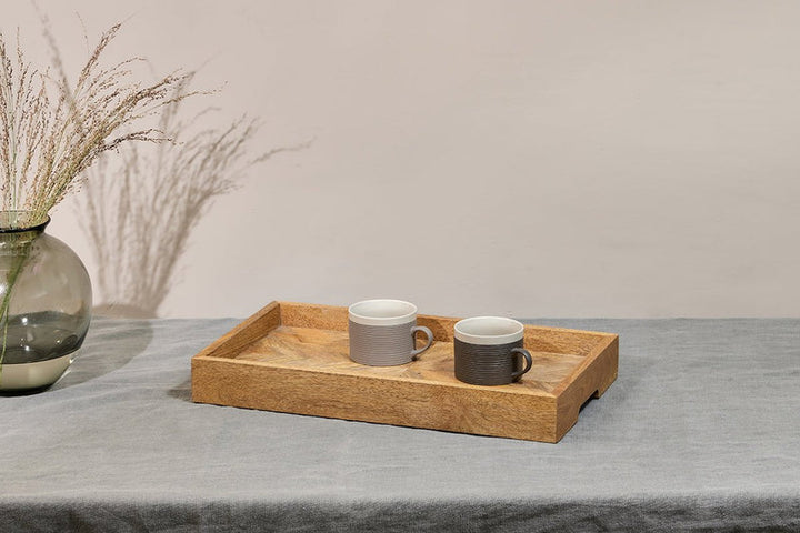 Nkuku Pawi mango wood breakfast tray with handles, perfect for serving breakfast in natural, rustic style.