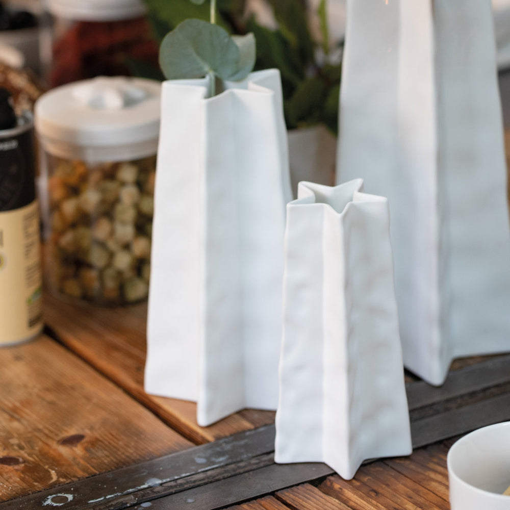 Medium Räder Star Vase by Cornucopia Home and Gift featuring a star-shaped design and decorative pattern.