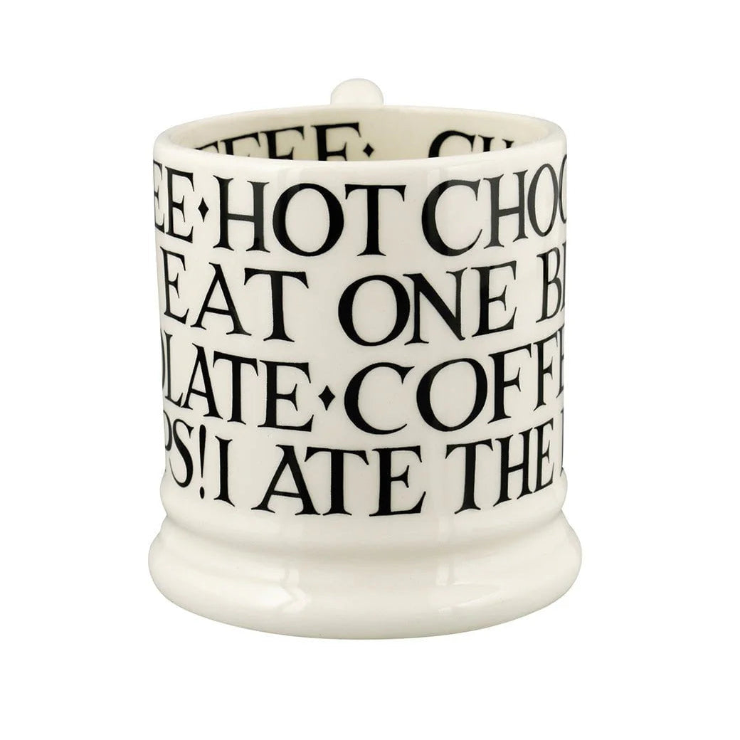Emma Bridgewater Black Toast all-over writing 1/2 pint mug with black text design on white ceramic, featuring a classic mug shape.