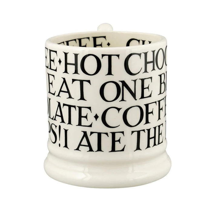 Emma Bridgewater Black Toast all-over writing 1/2 pint mug with black text design on white ceramic, featuring a classic mug shape.