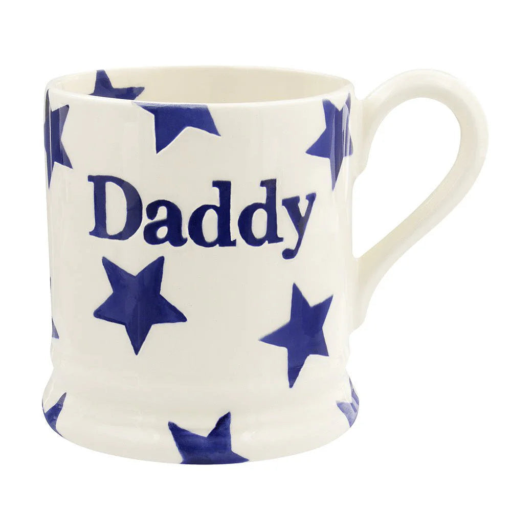 White mug with blue star pattern and 'Daddy' text on a white background