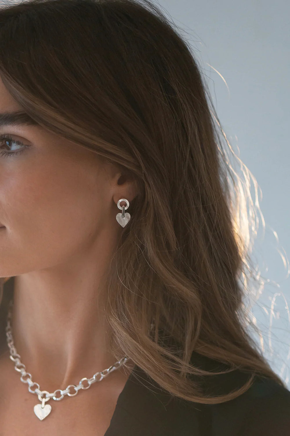 Silver Precious Earrings by Tutti & Co featuring delicate, elegant design with shiny silver finish.