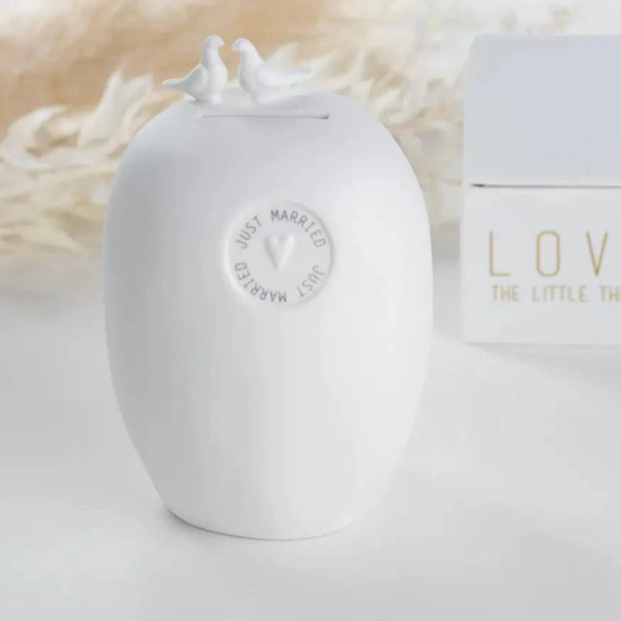 Radër porcelain money box with "Just Married" design by Cornucopia Home and Gift, featuring a decorative wedding-themed motif.