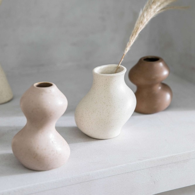 Set of three small Saburo Vases by Cornucopia Home and Gift, natural-colored gallery vases with smooth finishes.
