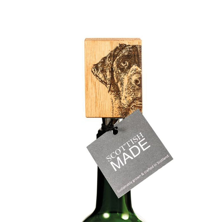 Selbrae House Labrador Oak bottle stopper from Cornucopia Home and Gift, crafted with detailed oak design for wine bottles.