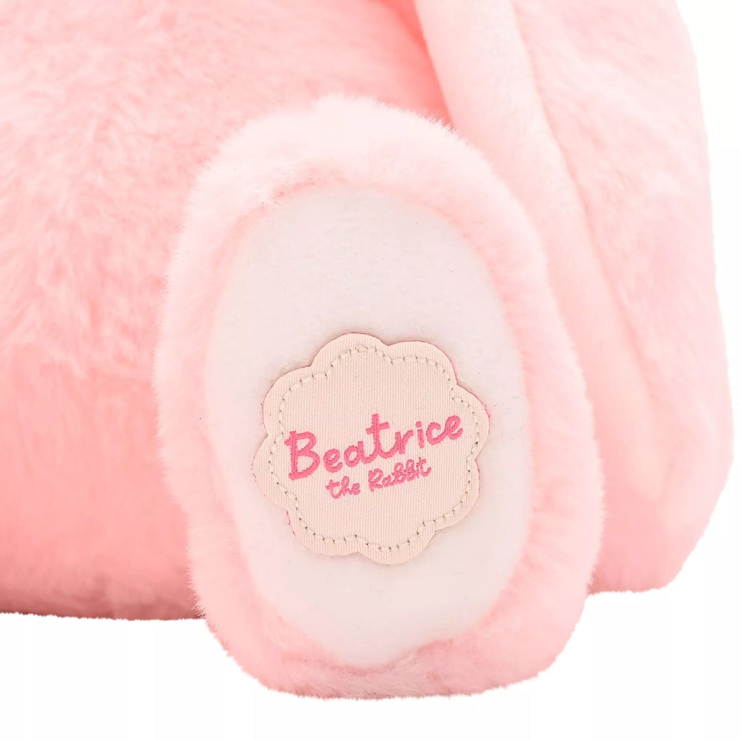 Soft pink plush bunny toy named Beatrice from Cornucopia Home and Gift, styled as a classical plush bunny by Widdop &amp; Co.