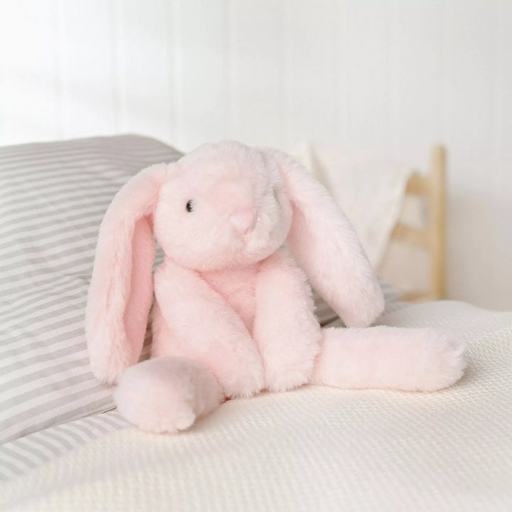 Soft pink plush bunny softie named Katie with long legs from Cornucopia Home and Gift, featuring a cute, cuddly appearance.