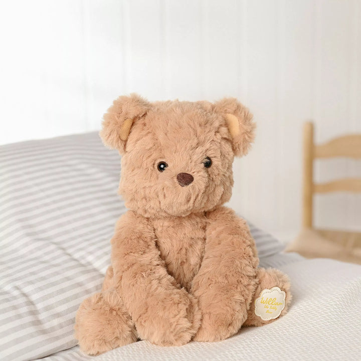 Soft plush William Teddy Bear sitting in brown, made by Widdop &amp; Co, perfect as a cozy gift from Cornucopia Home and Gift.